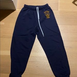 Comfy navy sweatpants with mascot logo!
